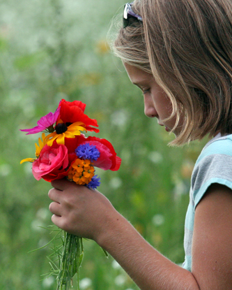 Abigail picking Wildflowers at Hemlock Hills
